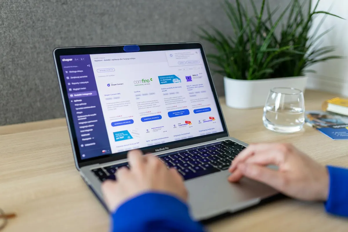 Content planning session with a storefront laptop, representing the Webflow Ecommerce vs Shopify decision for content-led brands.